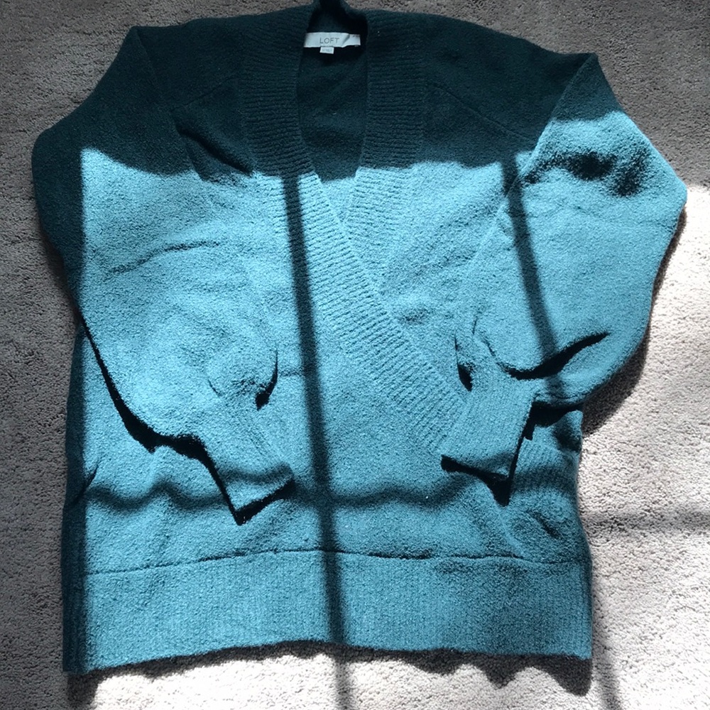 Faux wrap sweater with bubble sleeve